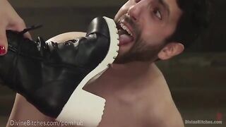 The strong dominatrix beats and wrestles her slaveboy in a thrilling HD video