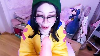A pretty cosplay girl, inspired by Valorant’s ljoy, fucks with a big dildo