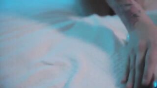 A young and sexy girl caresses herself with a Hitachi wand