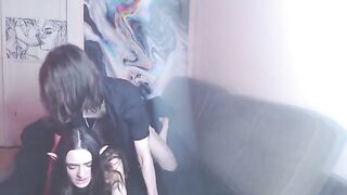An amateur couple enjoying intimate moments on their couch, creating content