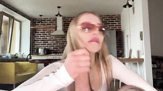 A pretty woman wearing glasses has sex with her boyfriend