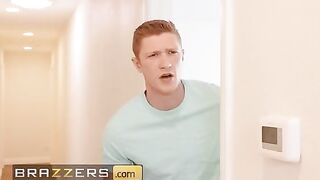 The stepson of Mellanie Monroe helps his stepmom when she gets stuck while setting up the laundry rack