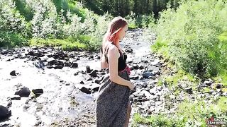 A pretty teen redhead fucks with a guy outdoors and gets creampied