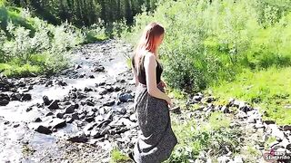 A pretty teen redhead fucks with a guy outdoors and gets creampied