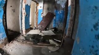 An exhibitionist girl walks through abandoned buildings in HD