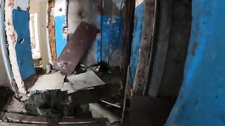 An exhibitionist girl walks through abandoned buildings in HD