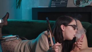 Nerdy girl in glasses smokes and sucks cock skillfully