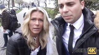 The blonde is having sex with a collector, her future husband watches