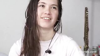 Cute American girl masturbates in the bathtub, showcasing natural beauty in an Ersties exclusive