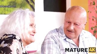 A voluptuous mature woman got fucked right on the table in front of her husband