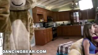 A group of girls are having a wild party with some guys