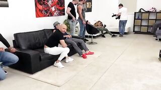 Monika Fox is being fucked by 7 guys with huge cocks, including intense DAP and anal action