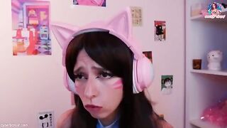 Gamer girl in cosplay of Dva from Overwatch, riding a big dildo