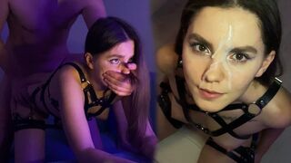 A hot brunette in a harness gets a cumshot on her face