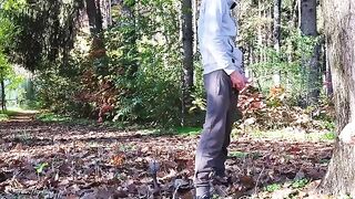 A guy masturbates publicly in the park, a hot MILF notices and joins in