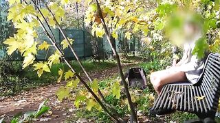 A guy masturbates publicly in the park, a hot MILF notices and joins in