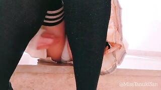 Hot Japanese schoolgirl wets her pussy in public, showcasing her daring side