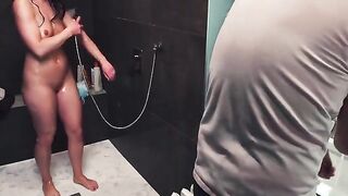 Babe jerked off her husband in the shower, ending with a ruined orgasm