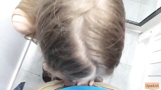 The petite girl was caught while giving a blowjob in the shop changing room