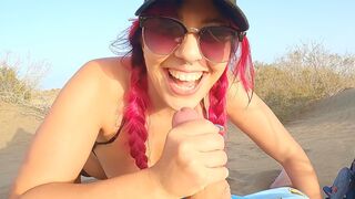 A girl is flashing her body on the beach while talking about intimacy