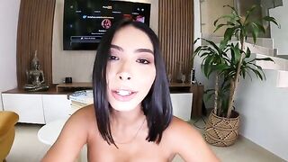 The girl is asking for help from a personal trainer in a steamy gym session