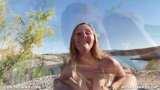A couple engaged in sex on a hard hiking with a beautiful view