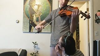 A couple has passionate sex while the girl practices her violin, showcasing real intimacy