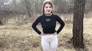 A hot chick is having fun with a guy in the forest