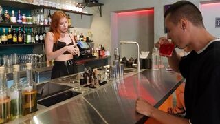 The hot bartender served not only drinks but also a sweet treat