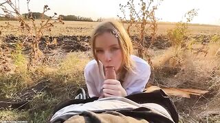 Beautiful Russian blonde has a blowjob in the forest at sunset