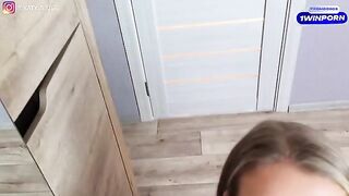 A sexy woman wearing only underwear is trying it on in the bedroom