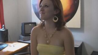 A woman is completely naked on her big natural tits