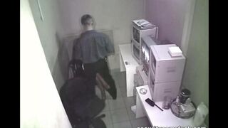 The camera captured the intimate moment in the workplace without notice