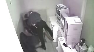 The camera captured the intimate moment in the workplace without notice