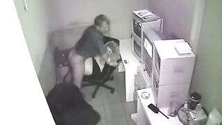 The camera captured the intimate moment in the workplace without notice