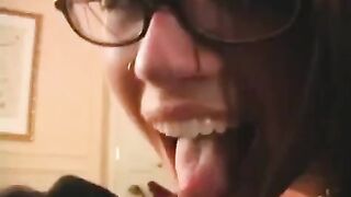 The fool is happy in glasses and the fact that they were given to suck a dick