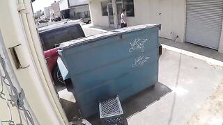 The couple got intimate behind the garbage tank, unnoticed