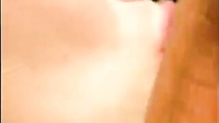 A man cum on the face of girlfriend near the pool