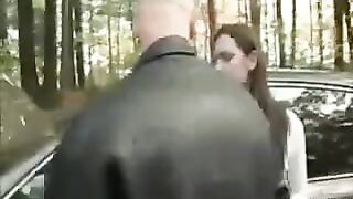 A girl was given a slap on the hood of the car
