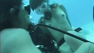 A man has sex with a hairy girl in the water