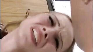 A girl is being fucked by a guy with a hand