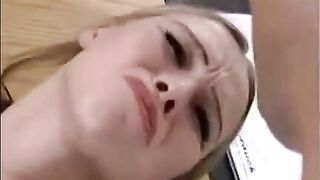 A girl is being fucked by a guy with a hand
