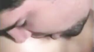 A man was having fun with a strapon, while another girl was fingering him