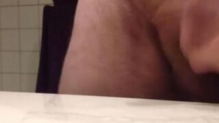 A man made a mess on the table with his hot sperm