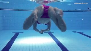 A beauty swims naked in the pool, creating a captivating scene
