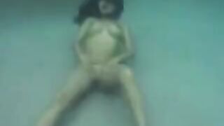 Busty brunette beauty gets fucked right in the ocean water