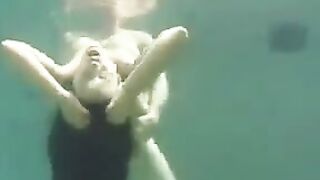 Busty brunette beauty gets fucked right in the ocean water