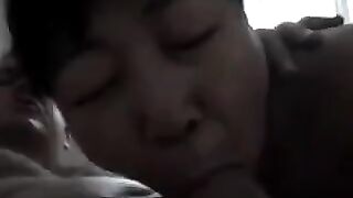 An adult Chinese woman practices on her new boyfriend