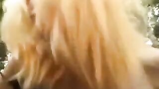 A cute young girl was fucking with a guy in the park without any complexes