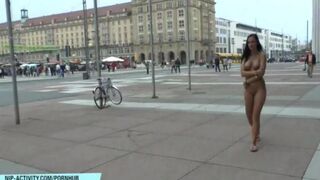 A sexy girl has a walk on the city streets